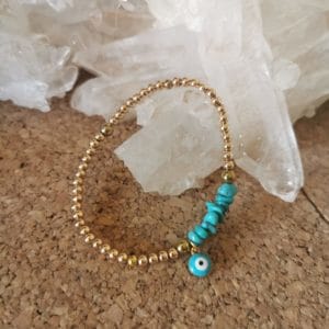 Bracelet en Hématite dorée, Turquoise naturelle et son Oeil de Protection