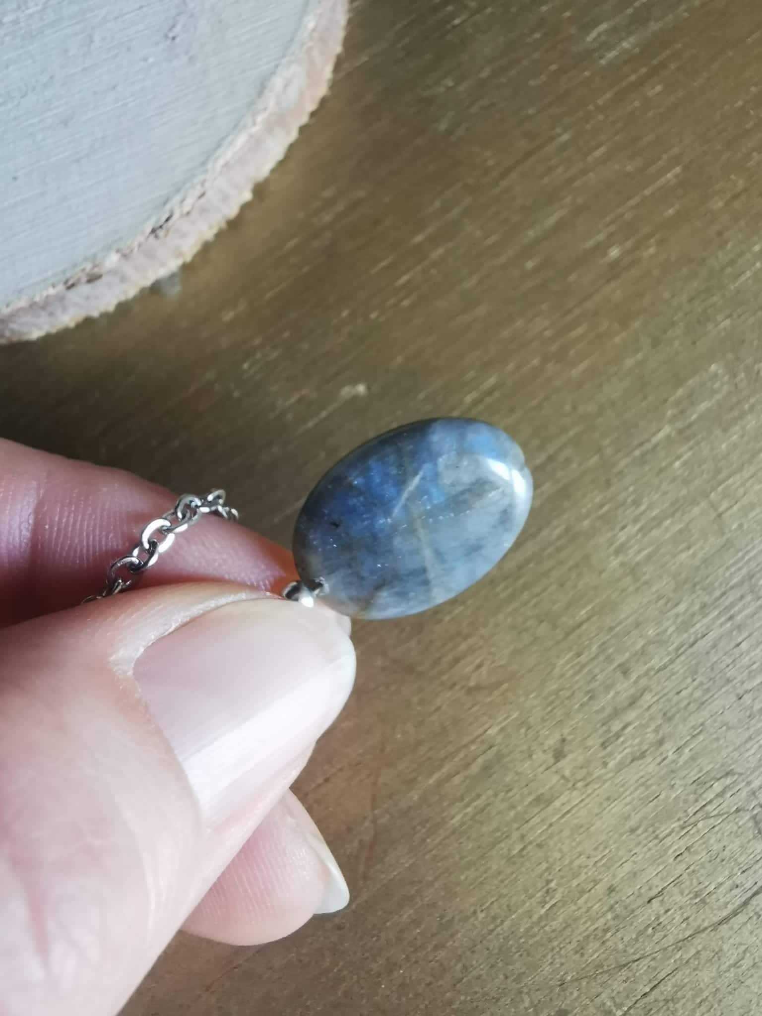 Pendule en Cristal de Roche et Labradorite............ Pendule en Cristal de Roche et Labradorite